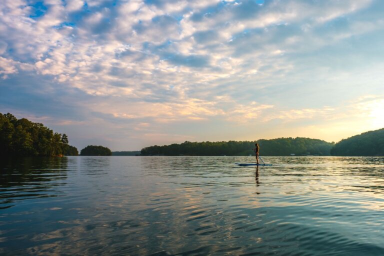 A paddleboarder on open water at Mary Alice Park