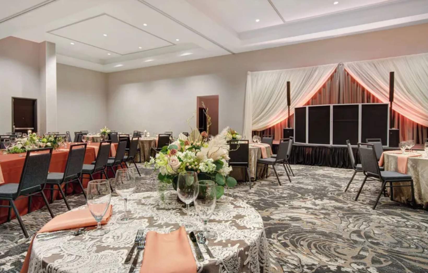 A reception set up in the ballroom at Embassy Suites by Hilton Alpharetta Halcyon
