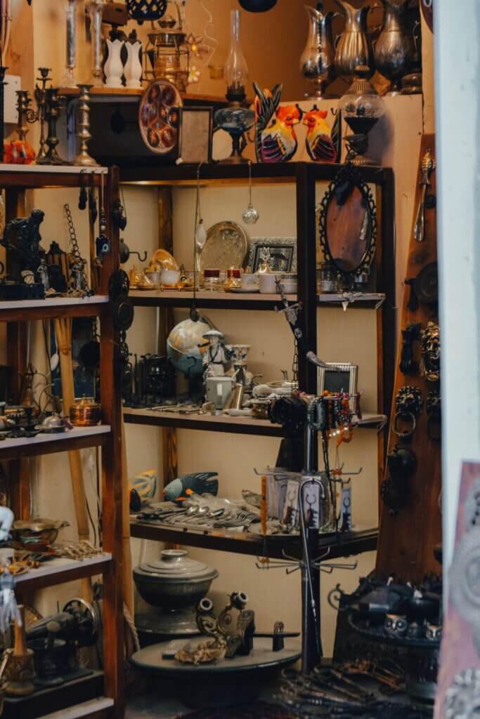 Stock photo: Shelves of vintage and secondhand items in a shop. Not an image of this business.